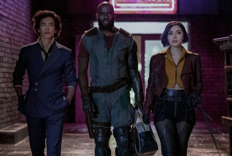 COWBOY BEBOP (L to R) JOHN CHO as SPIKE SPIEGEL, MUSTAFA SHAKIR as JET BLACK, DANIELLA PINEDA as FAYE VALENTINE and EIN in Cowboy Bebop Cr. GEOFFREY SHORT/NETFLIX © 2021