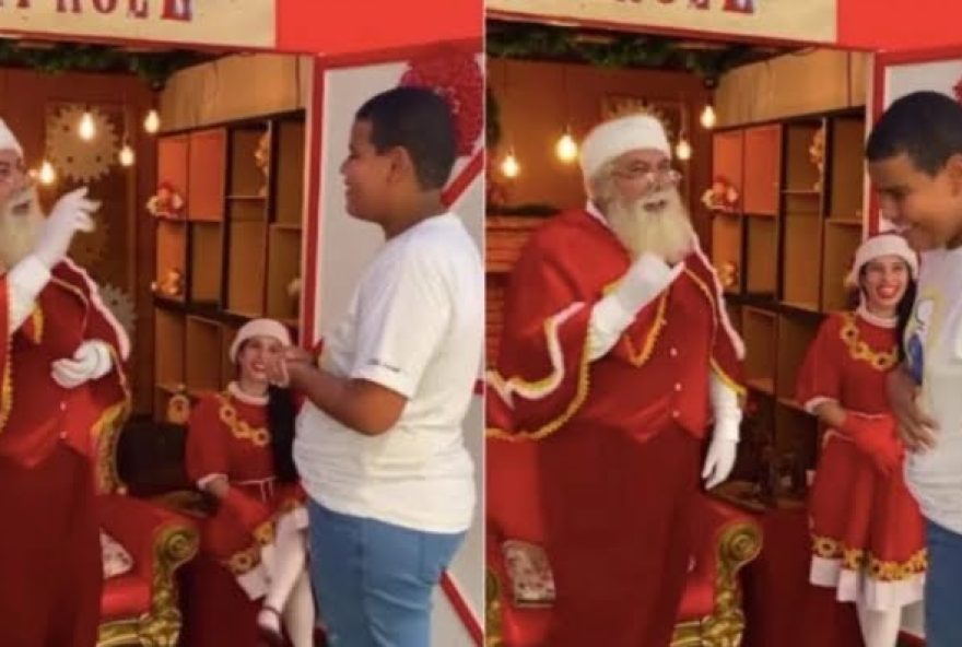 Jovem se comunica com Papai Noel em Libras