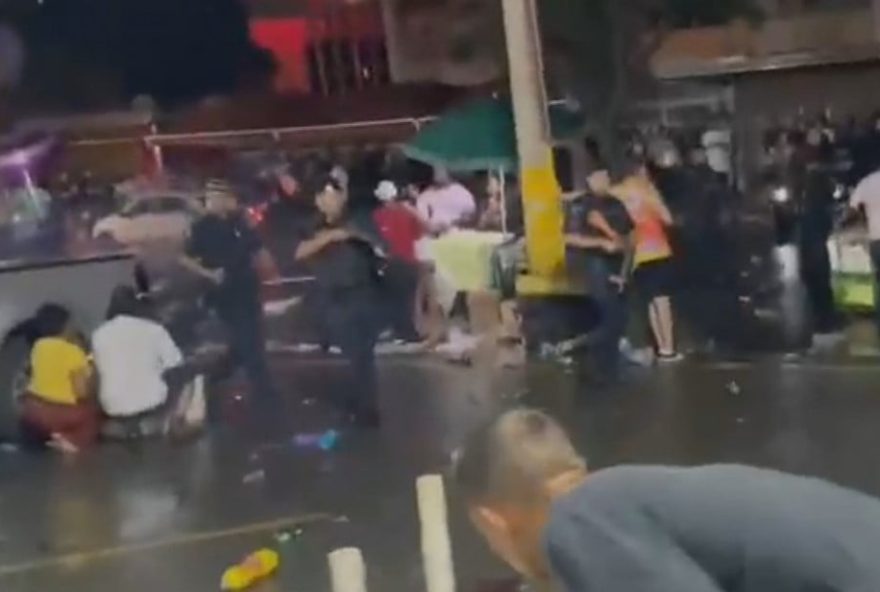 GCM encerra bloquinho de carnaval com bomba de gás em Goiânia. (Reprodução/Tv Anhanguera).