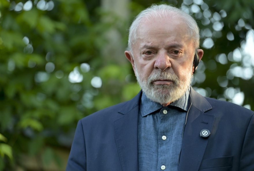 Brazil's President Luiz Inacio Lula da Silva stands outside Uruguayan former Jose 