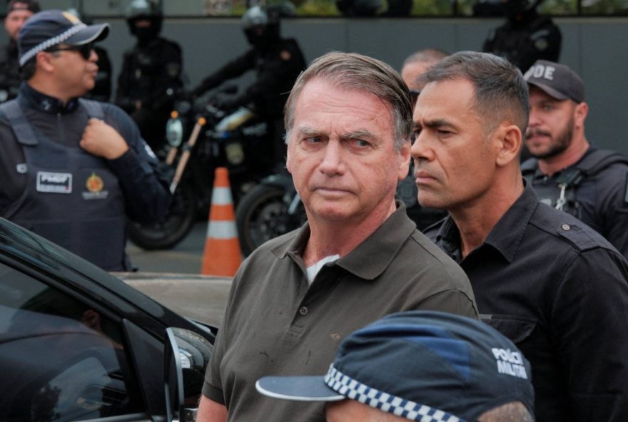 Former Brazilian President Jair Bolsonaro leaves the hospital where he went to undergo a skin surgery procedure, authorized by Supreme Court Justice Alexandre de Moraes, leaving the house arrest after being convicted by a Supreme Court majority of plotting a coup to remain in power after losing the 2022 election, in Brasilia, Brazil, September 14, 2025. REUTERS/Diego Herculano