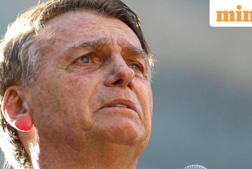 FILES-BRAZIL-POLITICS-JUSTICE-COUP-PRISON (FILES) Brazil's former President (2019-2023) Jair Bolsonaro speaks during a rally on Paulista Avenue in Sao Paulo, Brazil, on June 29, 2025. Bolsonaro, sentenced last September to 27 years in prison for a failed coup attempt but not yet serving his term, was taken into police custody on November 22 after trying to burn the ankle monitor tracking his house arrest, though he later claimed he acted out of paranoia when attempting to disable the device. (Photo by Miguel SCHINCARIOL / AFP)