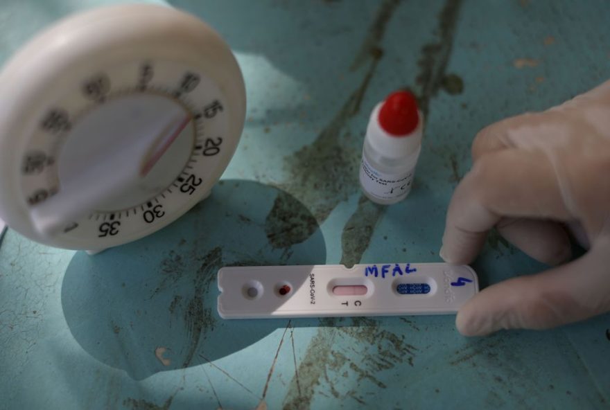 A health worker shows a test for the coronavirus disease (COVID-19), in the Bela Vista do Jaraqui, in the Conservation Unit Puranga Conquista along the Negro River banks, where Ribeirinhos (forest dwellers) live, amid the coronavirus disease (COVID-19) outbreak, in Manaus, Brazil, May 29, 2020. REUTERS/Bruno Kelly