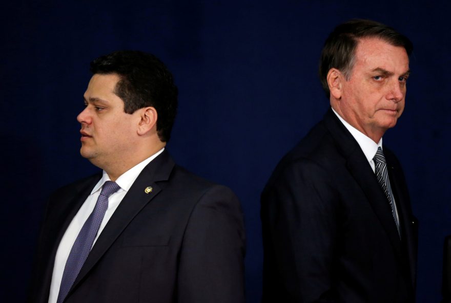 Brazil's President Jair Bolsonaro looks on near the President of the Senate Davi Alcolumbre during the handover ceremony for the new Prosecutor-General Augusto Aras (not pictued) in Brasilia, Brazil October 2, 2019. REUTERS/Adriano Machado - RC1244CEB400