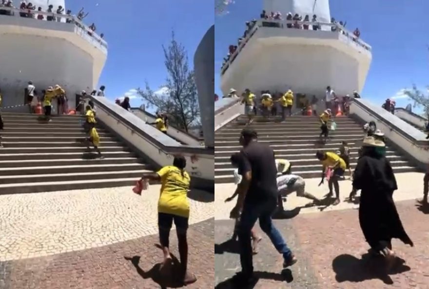 devoto-joga-dinheiro-para-cumprir-promessa-na-estatua-de-padre-cicero-em-juazeiro-do-norte