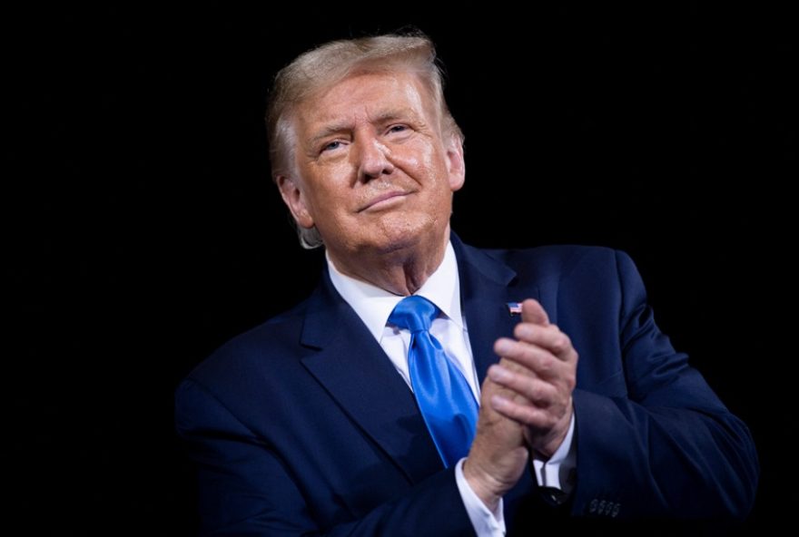 US President Donald Trump leaves after speaking at a campaign rally at Cecil Airport on September 24, 2020, in Jacksonville, Florida. (Photo by Brendan Smialowski / AFP)