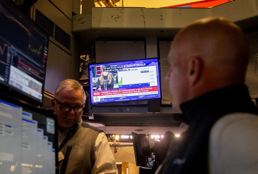 A television broadcasts tariff news on the floor of the New York Stock Exchange (NYSE) in New York, US, on Monday, April 7, 2025. The S&P 500 Index was down around 2% in early trading Monday, putting it almost 20% below the record high set less than two months ago.