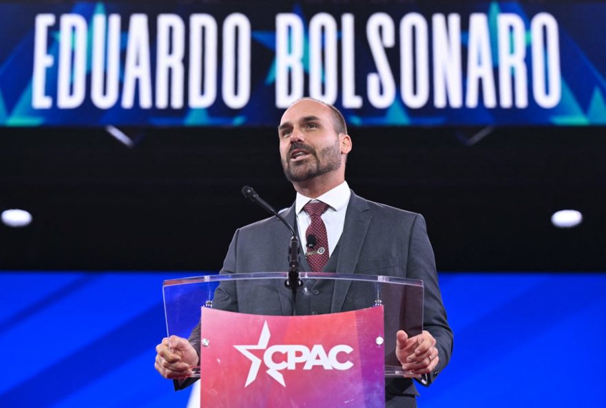(FILES) Brazilian politician Eduardo Bolsonaro, son of Jair Bolsonaro, speaks during the annual Conservative Political Action Conference (CPAC) at the Gaylord National Resort & Convention Center at National Harbor in Oxon Hill, Maryland, on February 20, 2025. Brazilian congressman Eduardo Bolsonaro is hailed by some as a slayer of tyrants pursuing his coup-accused father but has also been branded a 