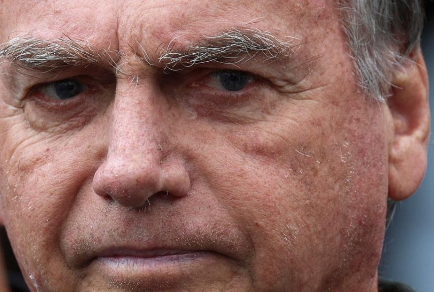 Former Brazilian President Jair Bolsonaro leaves the hospital where he went to undergo a skin surgery procedure, authorized by Supreme Court Justice Alexandre de Moraes, leaving the house arrest after being convicted by a Supreme Court majority of plotting a coup to remain in power after losing the 2022 election, in Brasilia, Brazil, September 14, 2025. REUTERS/Adriano Machado
