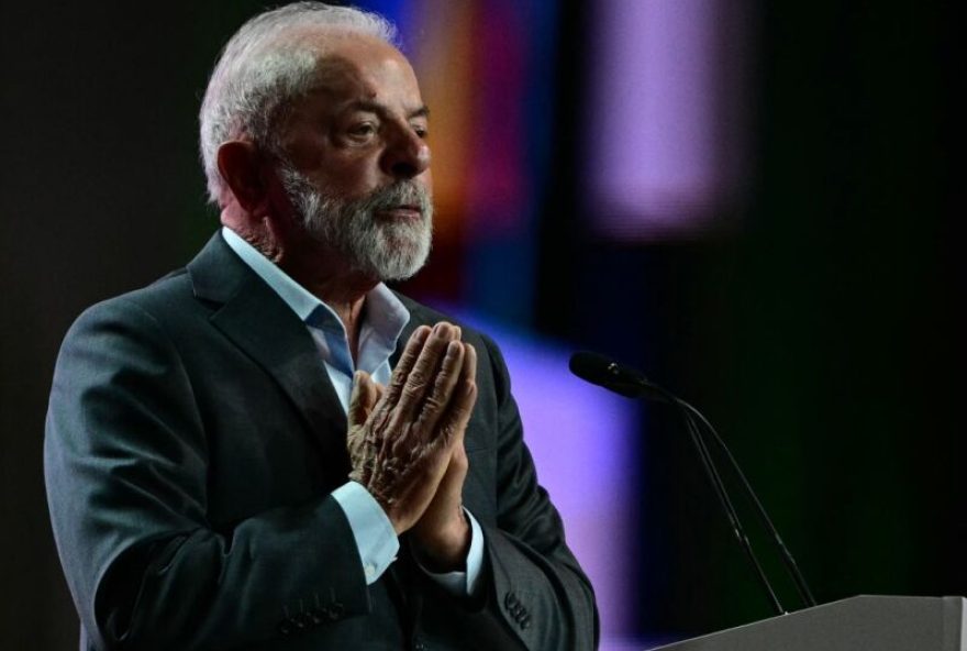 Brazil's President Luiz Inacio Lula da Silva gestures while delivering a speech during the COP30 UN Climate Change Conference opening ceremony in Belem, Para State, Brazil on November 10, 2025. The COP30 runs from November 10 to 21, and the 50,000 participants will feel the heavy, humid air of the Amazon rainforest, and face the daunting task of keeping global climate cooperation from collapsing.. (Photo by Pablo PORCIUNCULA / AFP)