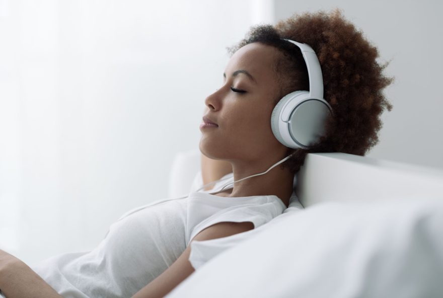 Woman Relaxing And Listening To Music