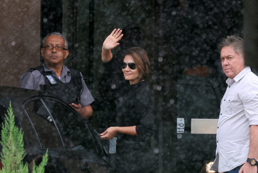 Brazil’s former President Jair Bolsonaro detained preventatively by police, in Brasilia Michelle Bolsonaro, wife of former President Jair Bolsonaro, gestures outside the Brazilian Federal Police Regional Headquarters, where Bolsonaro was taken, after he was placed into Federal Police custody, ending months of his house arrest, in Brasilia, Brazil, November 23, 2025. REUTERS/Mateus Bonomi