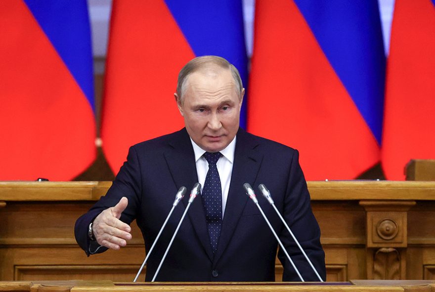 Russian President Vladimir Putin gestures while addresses a meeting of the Council of Legislators under the Russian Federal Assembly at the Tauride Palace, in St. Petersburg, Russia, Wednesday, April 27, 2022. (Alexander Demyanchuk, Sputnik, Kremlin Pool Photo via AP)