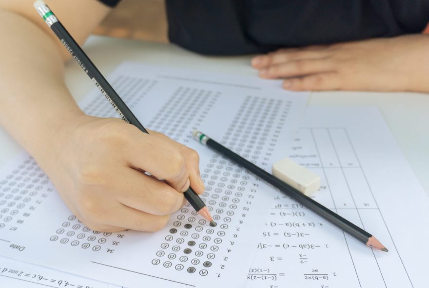 Students,Hand,Holding,Pencil,Writing,Selected,Choice,On,Answer,Sheets Students,Hand,Holding,Pencil,Writing,Selected,Choice,On,Answer,Sheets