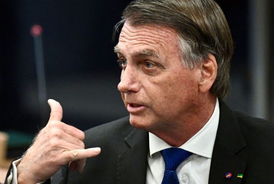(FILES) Former Brazilian President Jair Bolsonaro gestures during a session of the Brazilian Supreme Court judging the participation of those accused of the attempted coup d'état in January 2023, in Brasilia on June 9, 2025. The defendants in the coup trial of Brazil's far-right former president Jair Bolsonaro began testifying at the Supreme Court on Monday. Bolsonaro, who governed Brazil from 2019 to 2022, will take the stand along with seven co-accused on charges of plotting to overturn the results of the 2022 elections that Bolsonaro lost to leftist President Luiz Inacio Lula da Silva.  (Photo by EVARISTO SA / AFP)