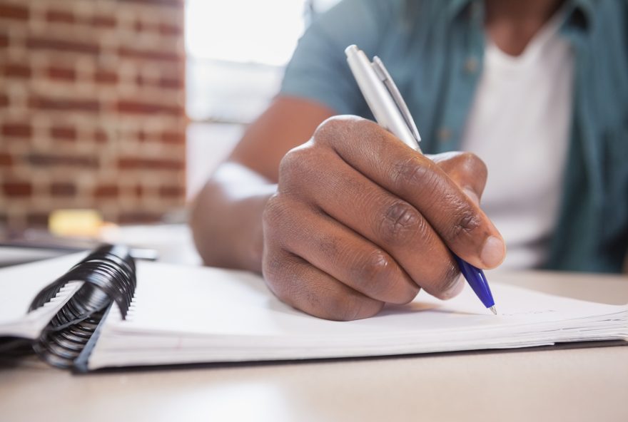 Casual businessman working at his desk in the office Casual businessman working at his desk in the office